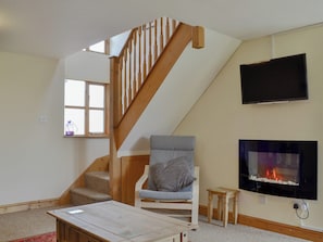 Comfortable living room | The Stables - Smiths Farm Cottages, Charmouth, near Lyme Regis