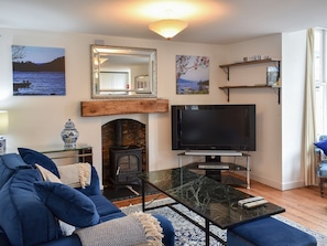 Cosy living area with wood burner | Station House, Staveley, near Kendal