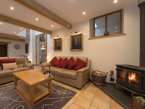 Living area with wood burner | Y Beudy, Pwllglas, near Ruthin