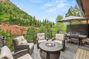 The newly expanded back deck is a wonderful retreat.  Wether relaxing or dining, your group will appreciate this extended space.