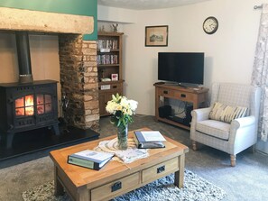 Comfortable living room with cosy wood burner | Greenpastures, Patchacott, near Okehampton