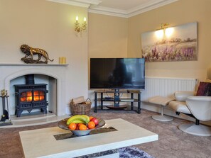 Spacious living room with wood burner | Maesbangor Farmhouse - Maesbangor, Capel Bangor, near Aberystwyth
