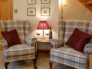 Living room with wood burner | Rose Cottage, Betws-y-Coed