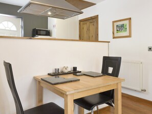 Convenient dining area | The Pigsty, Llanddeusant, near Holyhead