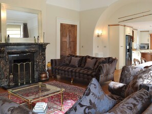 Characterful living area with feature fireplace | Ebbe Retreat, Beadnell