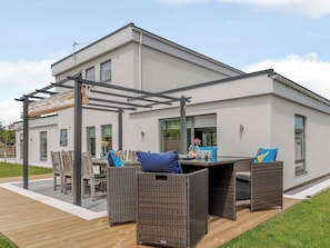 Relaxing patio area | Rosedene, Colwell Bay, near Yarmouth