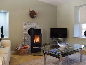 Lounge area with wood burner | Briar Cottage, Gargunnock, near Stirling