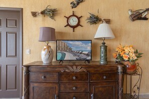 The entertainment center in the living room.