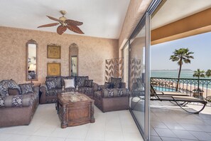 Sliding doors open the onto the patio from the living room.