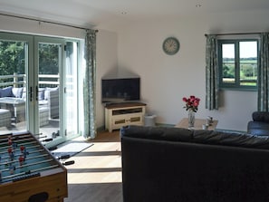 Sitting room with table football | East Croft Barn, Halwill, near Holsworthy