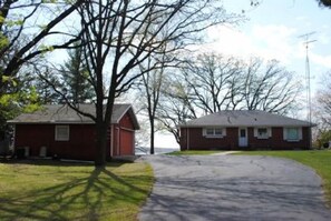 Wide driveway with ample space to park cars or boat and trailer during your stay