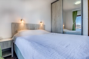 Comfortable double bed for two people.