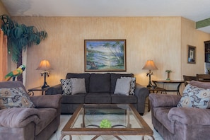 Living room with comfortable sofas and chairs