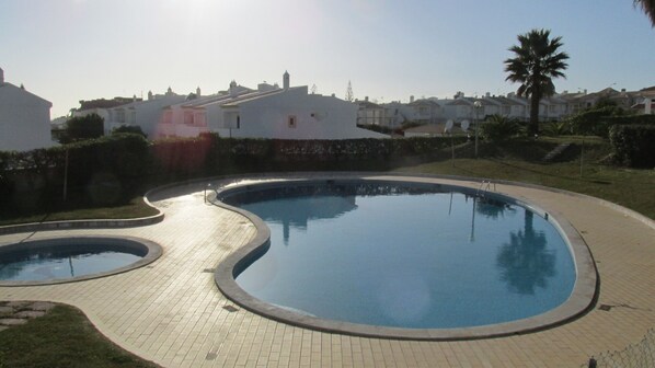 Large swimming pool for adults and a small one for children, large garden, sea view, lawn,