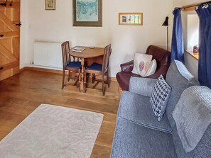 Living room with dining area | The Cider Press - Lawn Farm Retreats, Welland, near Malvern