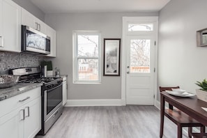 Kitchen looking out onto the deck and yard