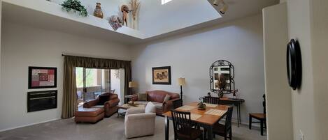 Living Room & Dining Room with vaulted ceiling