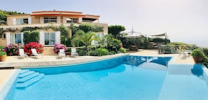 Front view of villa and pool terraces