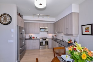 Fully equipped kitchen, high end appliances, coffee, tea, spices and more await!