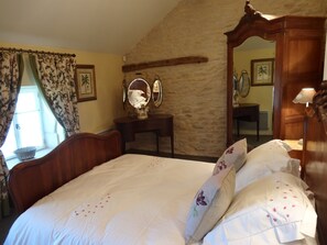 Bedroom with French linens and furnishings