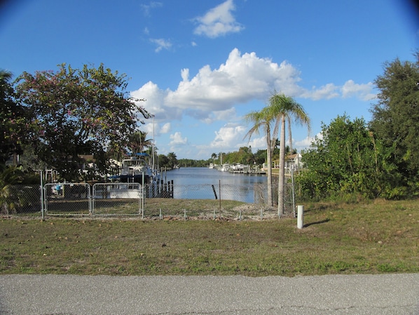 River view via front porch & channel to the Caloosahatchee River