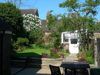 Garden Cottage es una casa pequeña y catalogada en una de las calles más bonitas.