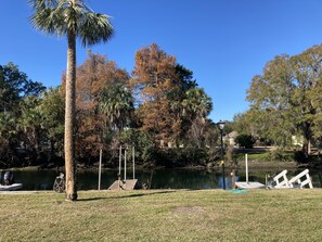 Open courtyard and boat dock in deep crystal clear canal.  Great swimming!