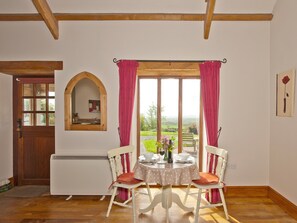 Dining area with lovely wooden floors | Timberway, Okehampton