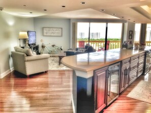 Family Room with 40" Television adjacent to Kitchen