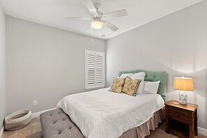 Queen bed, window with plantation shutter, and French door closet 

*2nd bedroom