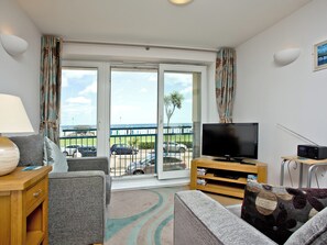 Relaxing living area with sea views | 16 Belvedere Court, Paignton