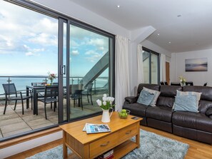 Living and dining areas overlooking the beach | Sand Dunes - Nassau Court, Westward Ho!