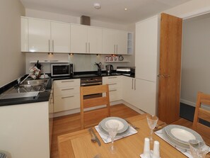 Dining area with Well-equipped fitted kitchen | Tidal Bay - Horizon View, Westward Ho!