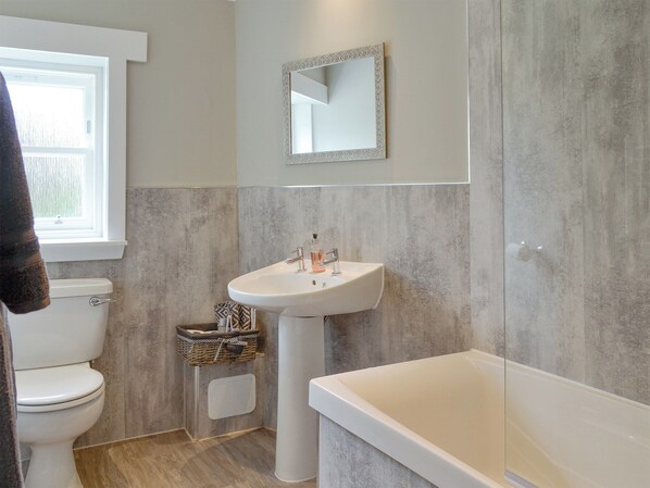 Family bathroom with shower over bath | The Old School House Cottage, Kettins, near Blairgowrie