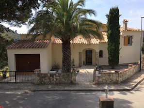 Front of Villa Florencia, parking outside.