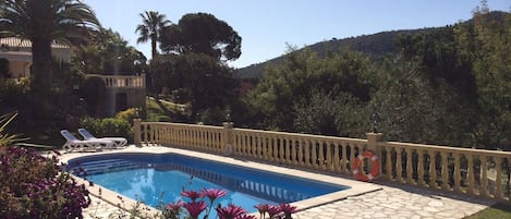 Large landscaped very sunny garden with lovely views, the sea is over the hill