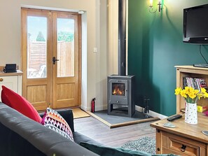 Welcoming living area with wood burner | Nuthatch Barn - Little Derril, Derril, near Bude