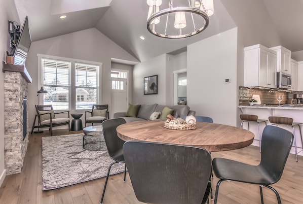 Bright and comfortable living area with vaulted ceiling