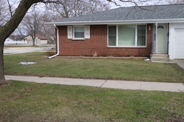 Large Corner lot with plenty of parking on the side street and church