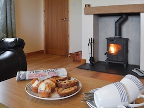 Living room with wood burner | Rhosydd Cottage, Llandyfrydog, near Amlwch