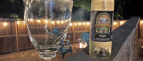 Be our guest, sit back, enjoy the fire, & a glass of wine form our local winery.