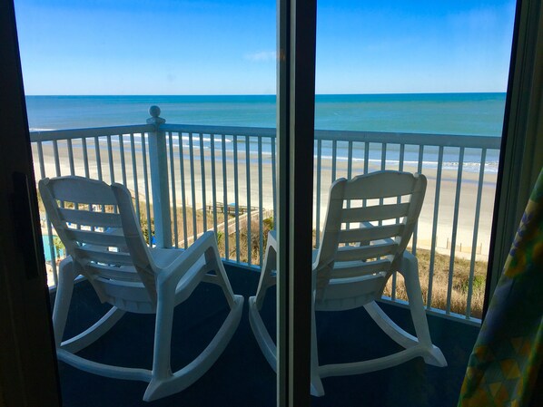 Enjoy rocking on the large wrap around oceanfront balcony.