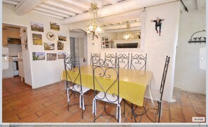 Kitchen and dining room in Petite Maison
