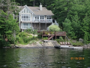 2nd view of cottage from the lake with new docks