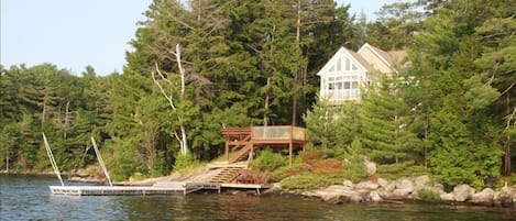 View of cottage and docks from the lake