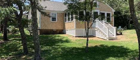 View from entrance drive with new porch.  (prior to bushes and landscaping)