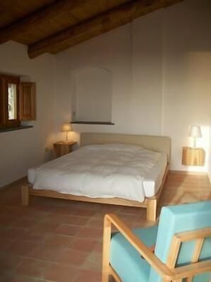 bedroom with access to the roof terrace