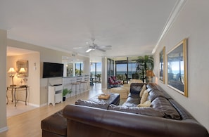 Facing the Gulf, lg living rm, kitchen is straight, foyer-left, desk area behind