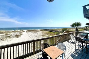 The balcony is open for each set of "3" townhomes. No privacy dividers but the deck in front of your townhome is for your use only.