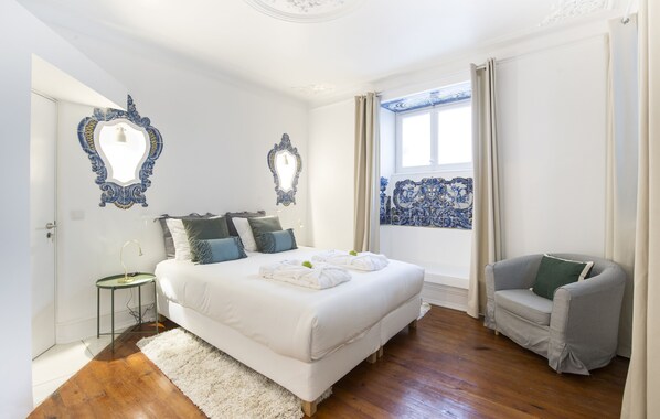 The Main bedroom with double bed (160cm x 200cm) and clothes rack
